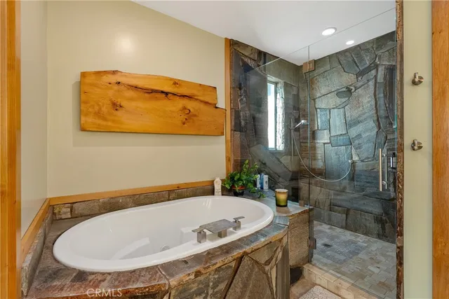 a kitchen with stainless steel appliances granite countertop a sink and a counter