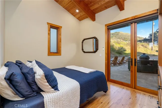 a bathroom with a granite countertop sink mirror and