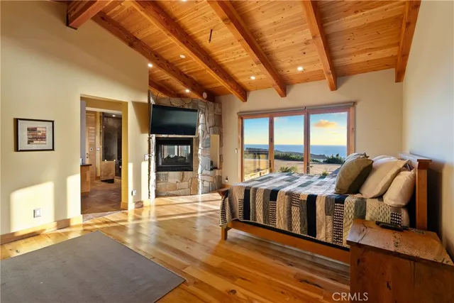 a view of a kitchen with a sink and wooden floor