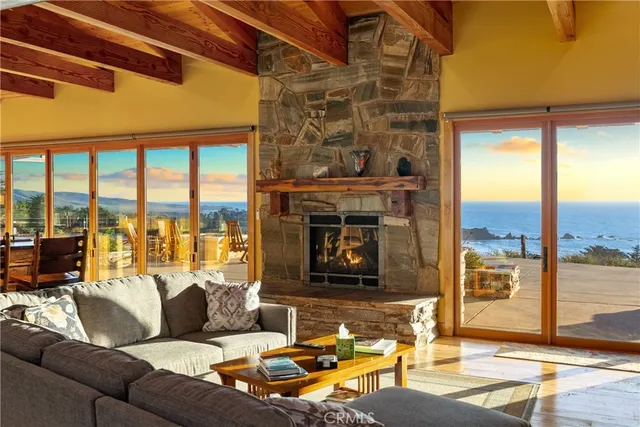 a view of a chairs and table in patio