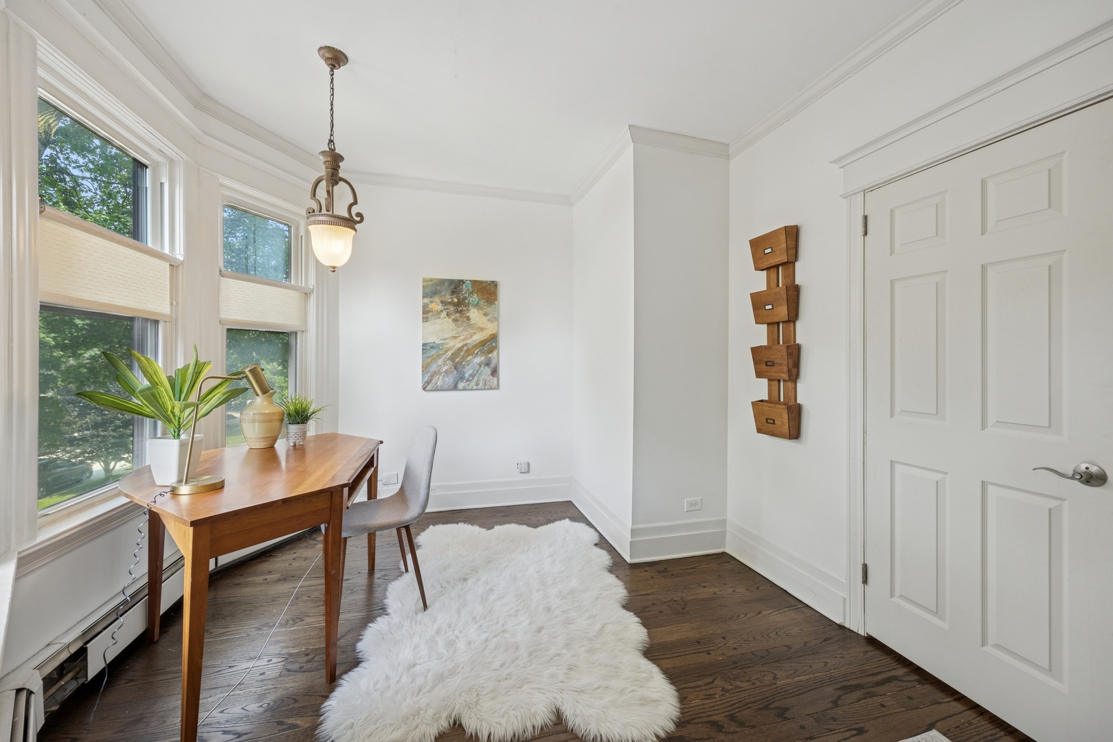 138 Clinton Avenue, Unit 2 Oak Park, IL 60302 - Photo 5 of 12 a workspace with furniture and window