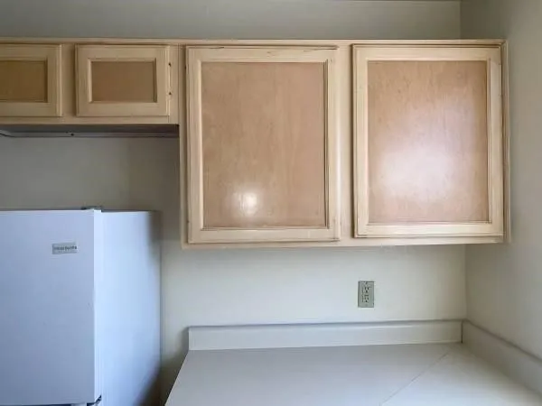 a kitchen with a stove and a microwave