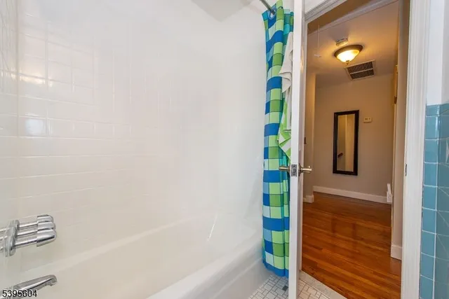 a bathroom with a mirror