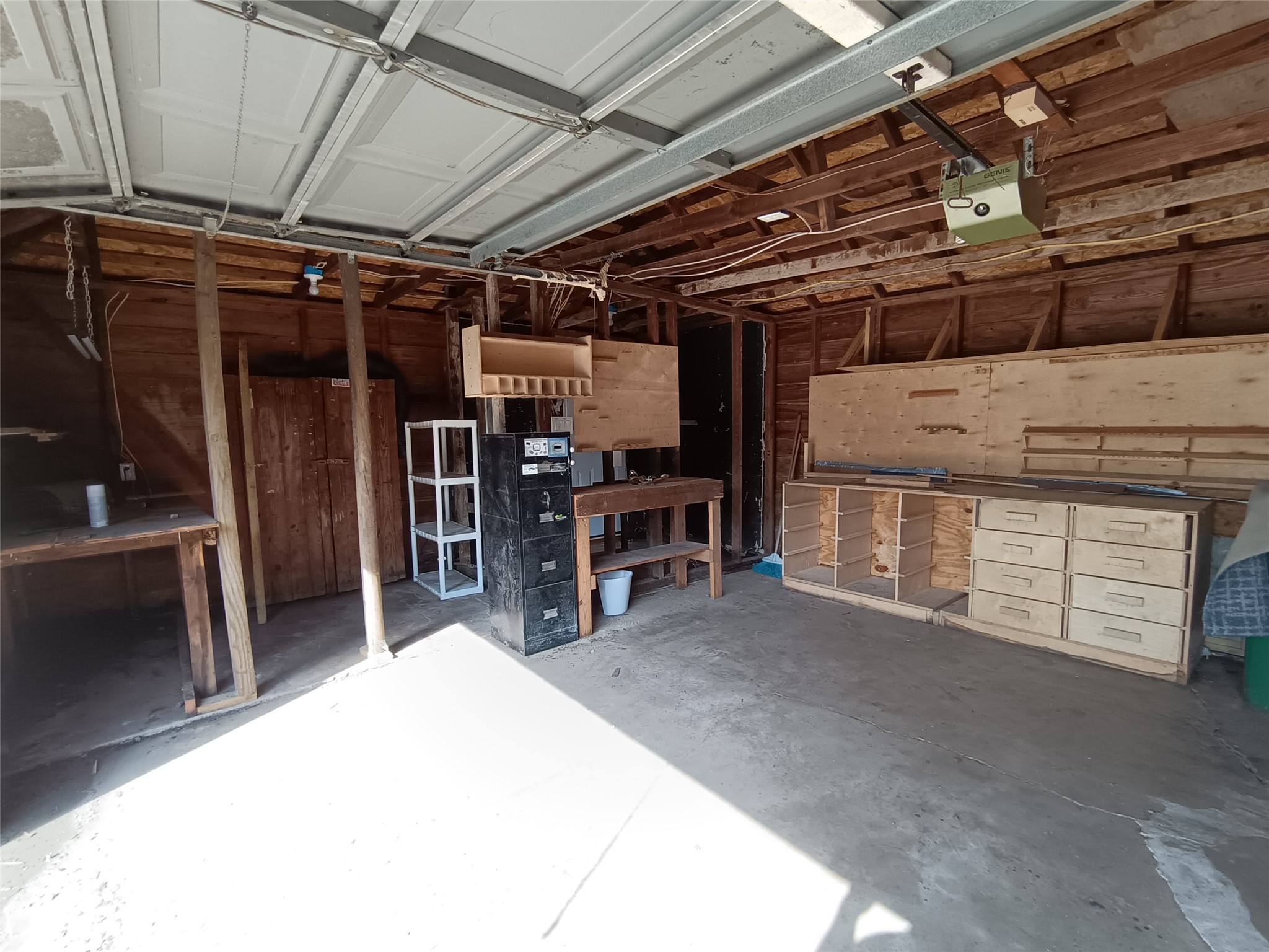 6906 Van Etten Street Houston, TX 77021 - Photo 30 of 30 A lot of shelving and workroom space in the garage.