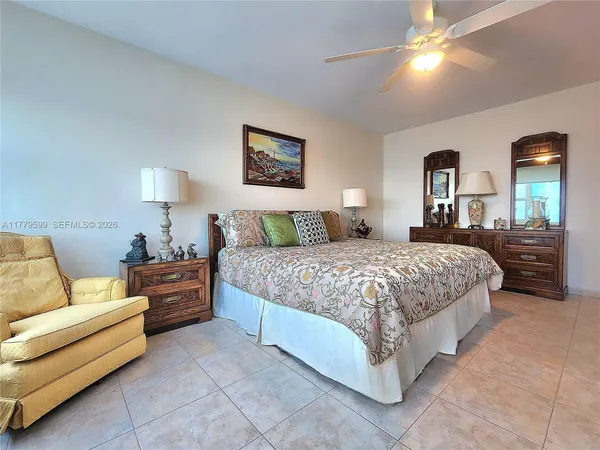 a bathroom with a sink a mirror and a window