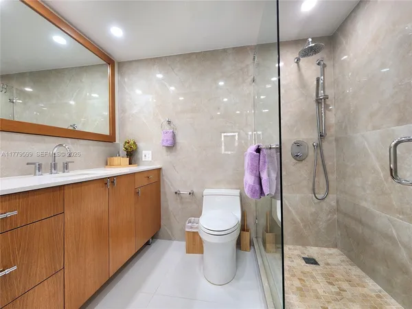 a view of a swimming pool with an ocean view