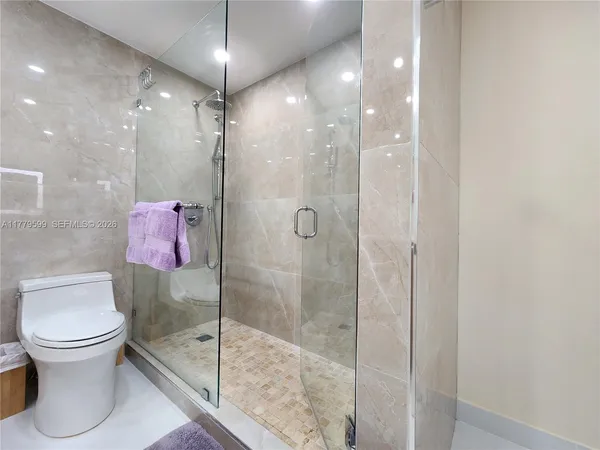 a view of a swimming pool with a yard