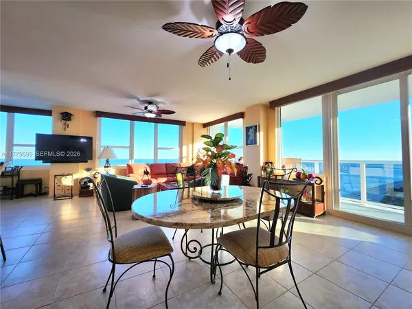 a kitchen with stainless steel appliances a stove a microwave and sink