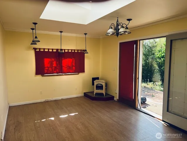 a room with furniture and a chandelier