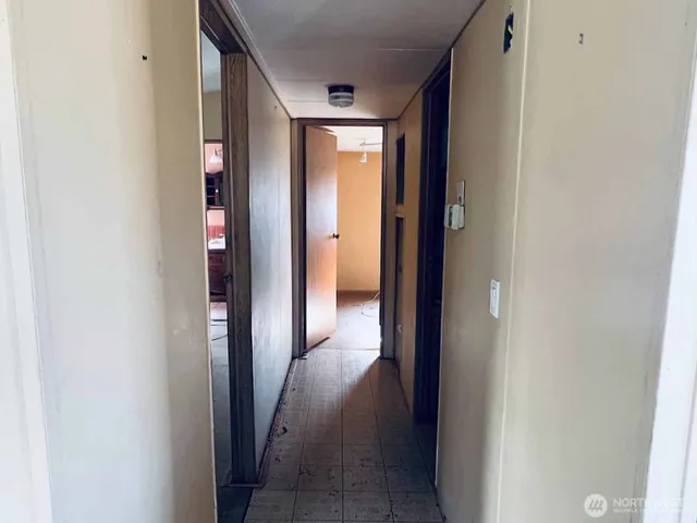 an empty room with windows