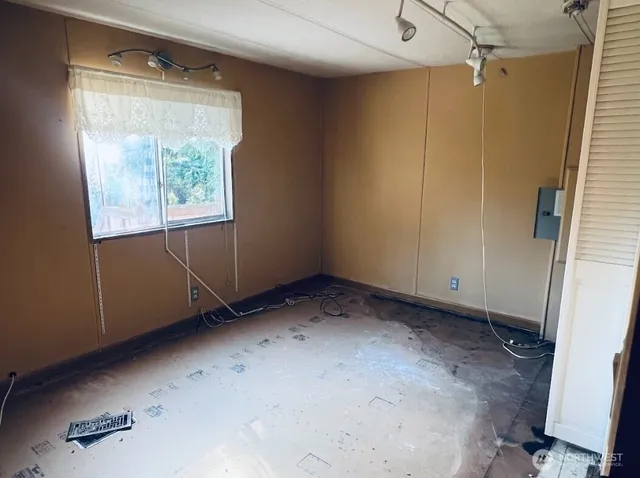 a bathroom with a toilet and a sink