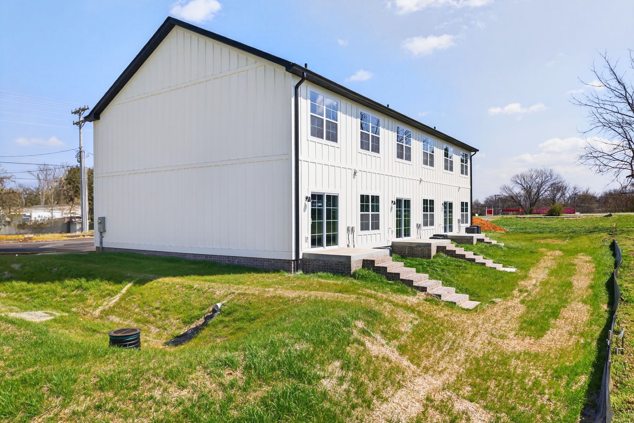 216 West Jere Whitson Road Cookeville, TN 38501 - Photo 3 of 31 a view of a house with backyard and sitting area