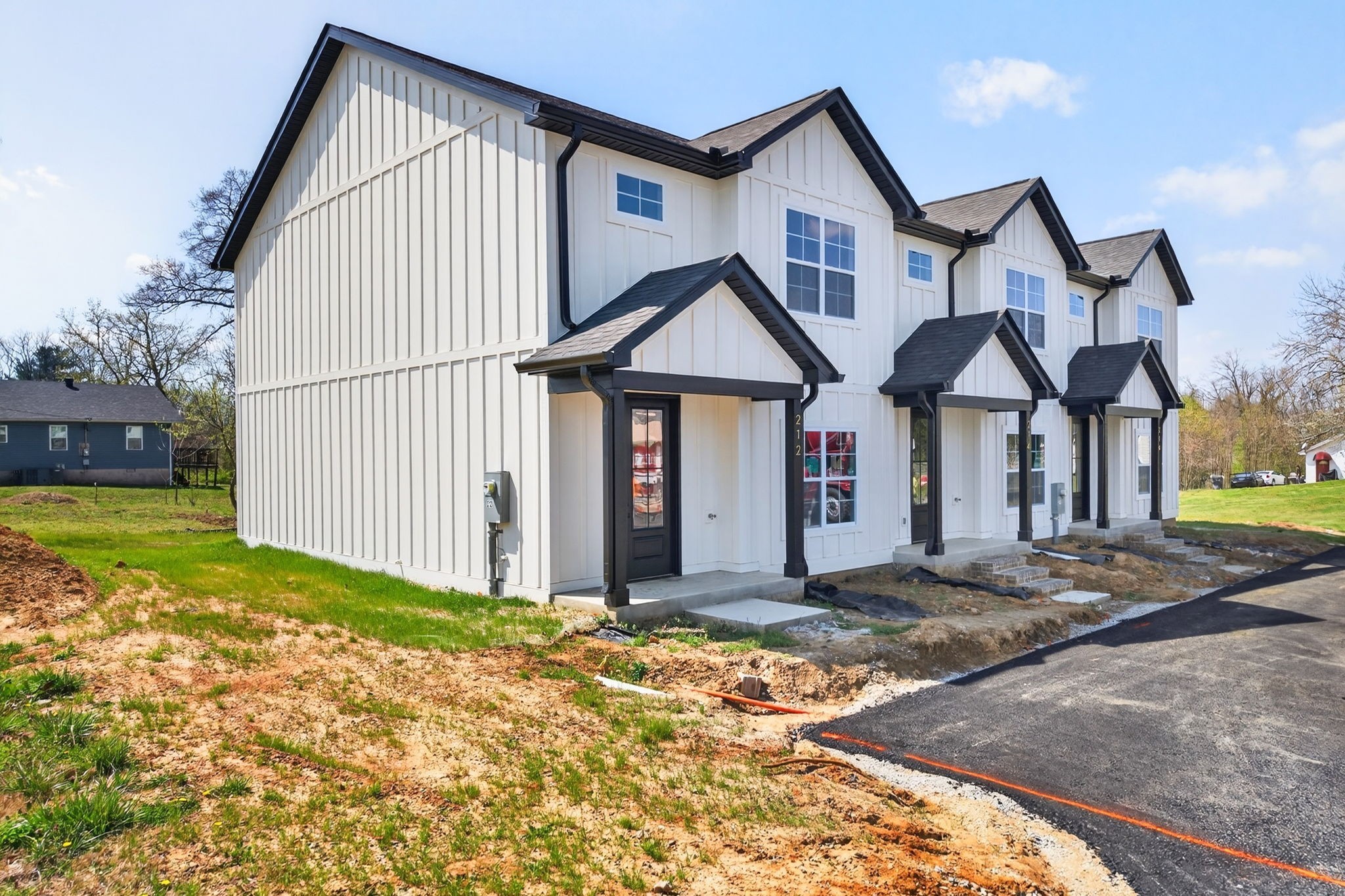 216 West Jere Whitson Road Cookeville, TN 38501 - Photo 6 of 31 a front view of a house with garden