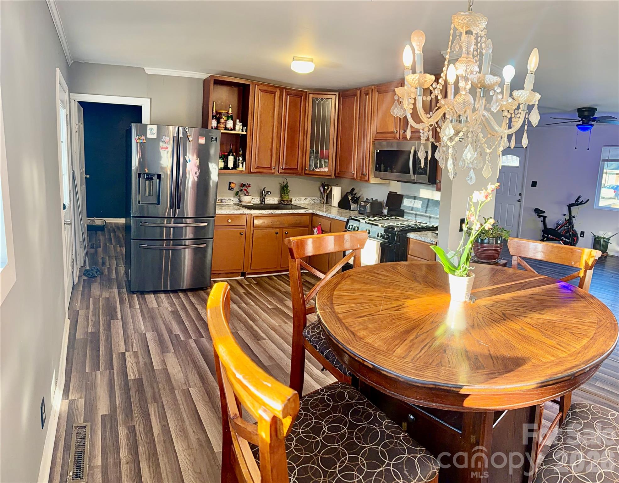 433 Brevard Street Statesville, NC 28677 - Photo 8 of 33 a very nice looking dining room with a dining table chairs and kitchen view