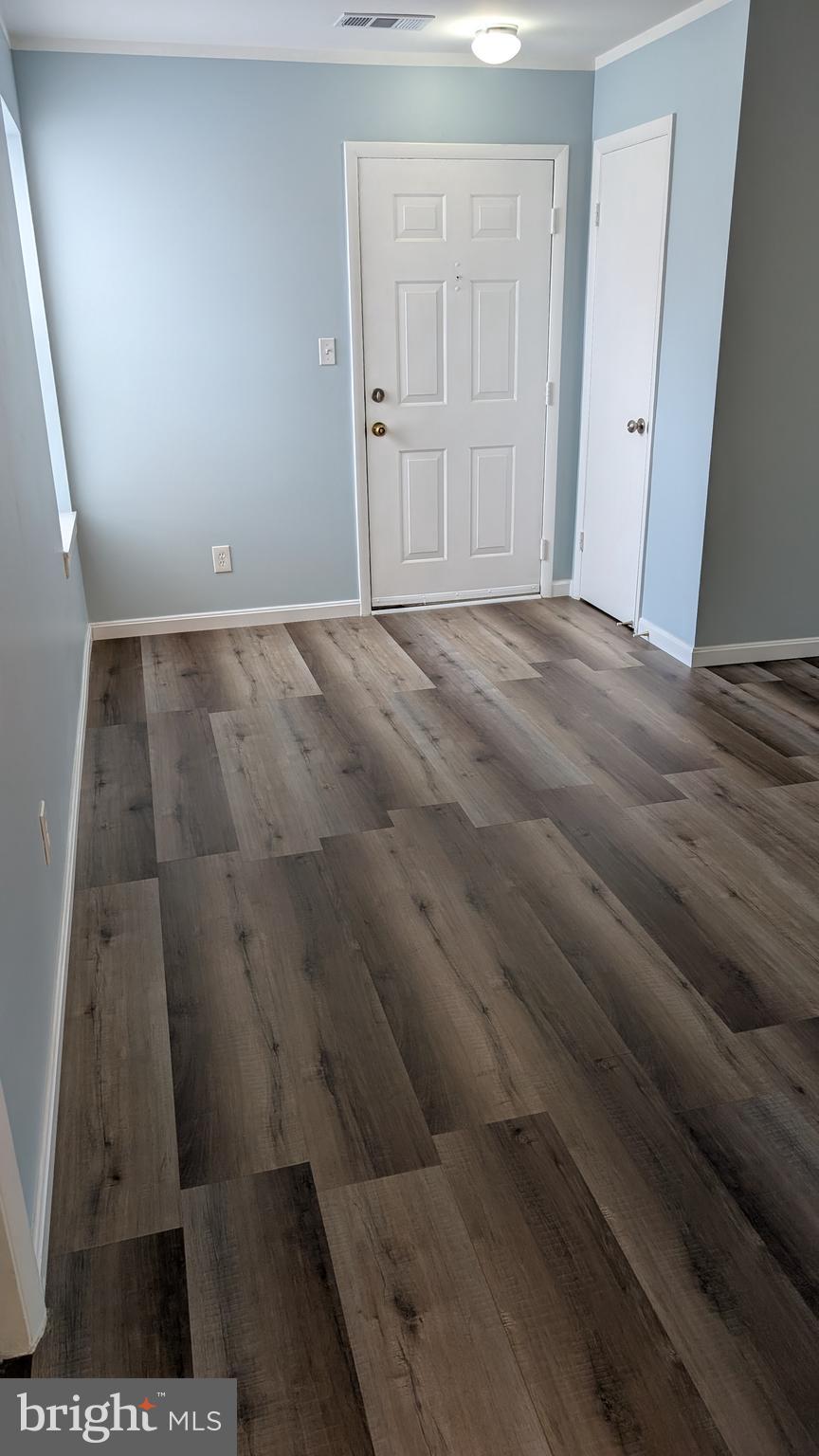 13402 Shady Knoll Drive, Unit 13402 Silver Spring, MD 20904 - Photo 4 of 22 a view of wooden floor
