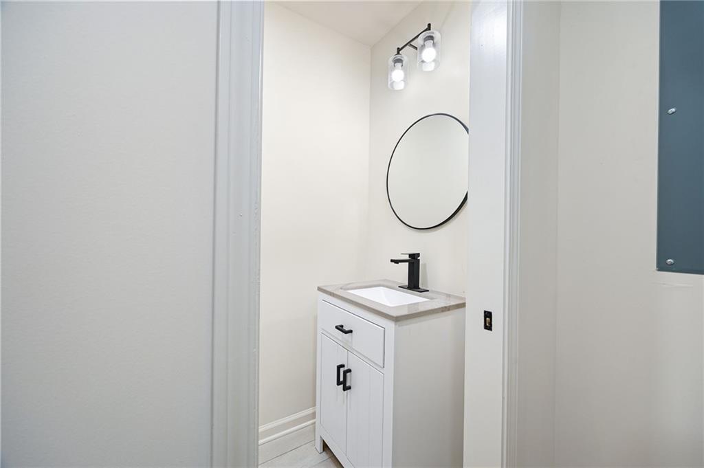 4289 Kimball Road Southwest Atlanta, GA 30331 - Photo 8 of 20 a bathroom with a sink and a mirror