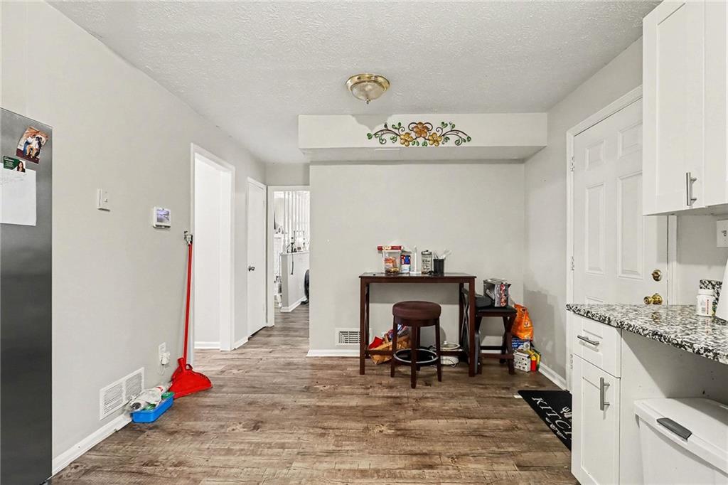 4494 Huntsman Bend Decatur, GA 30034 - Photo 13 of 27 a view of kitchen appliances with furniture and toys
