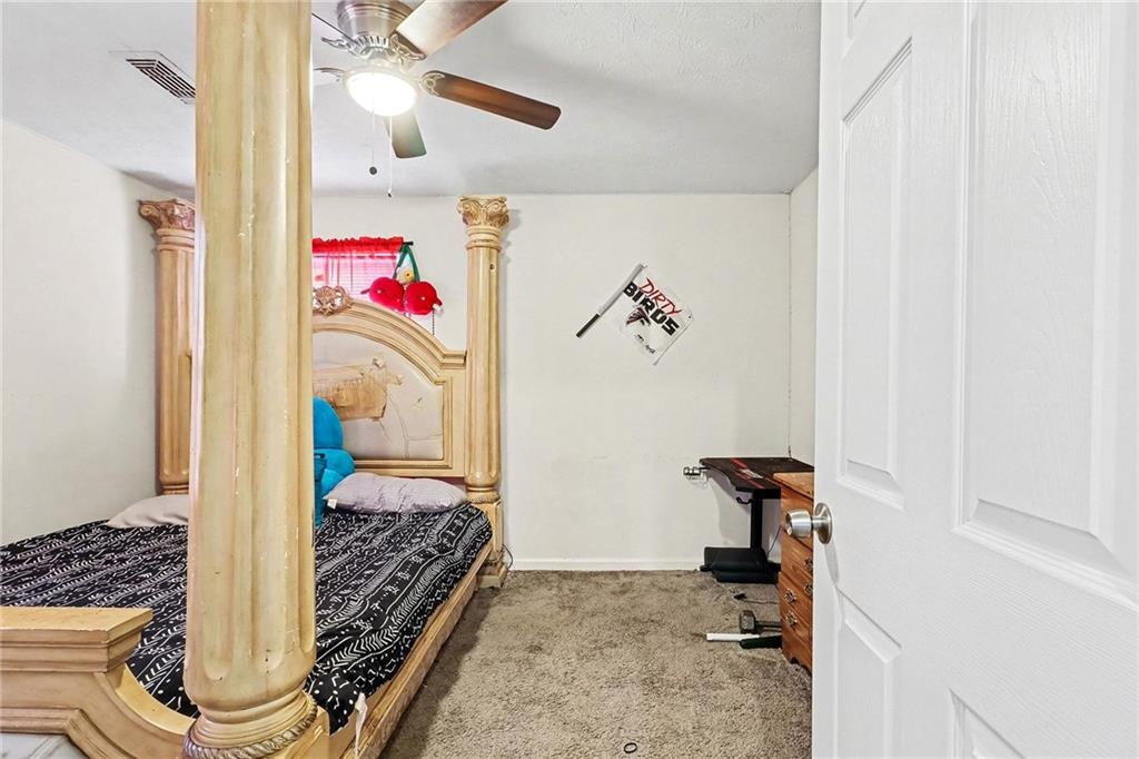 4494 Huntsman Bend Decatur, GA 30034 - Photo 17 of 27 a bedroom with a bed and a window