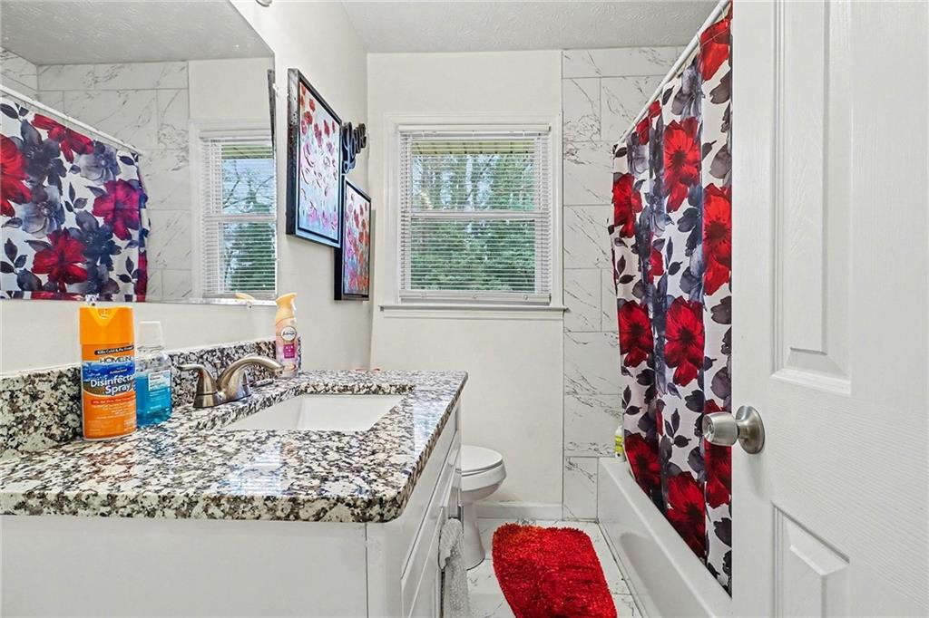 4494 Huntsman Bend Decatur, GA 30034 - Photo 19 of 27 a view of living room with furniture and flowers