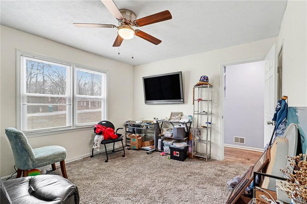 4494 Huntsman Bend Decatur, GA 30034 - Photo 21 of 27 a living room with furniture and a flat screen tv