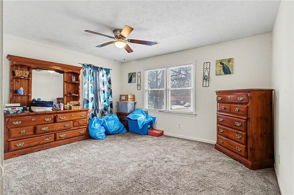 4494 Huntsman Bend Decatur, GA 30034 - Photo 23 of 27 a bed room with furniture and a window