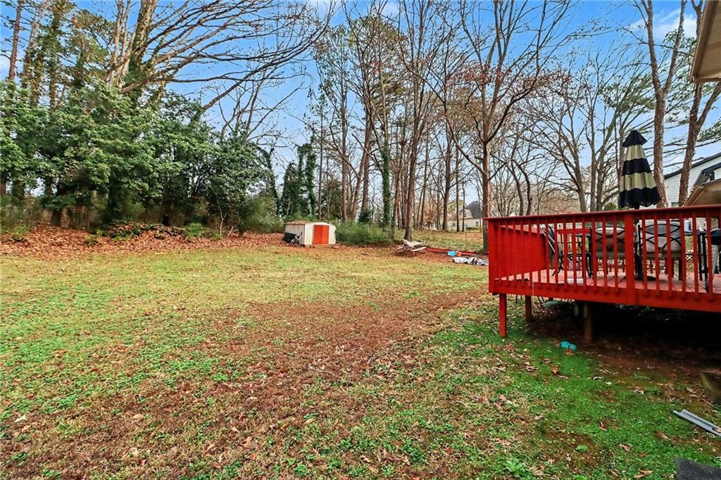 4494 Huntsman Bend Decatur, GA 30034 - Photo 25 of 27 a view of a street with a bench and trees