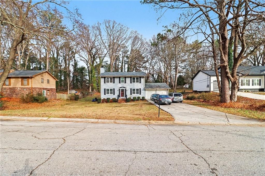 4494 Huntsman Bend Decatur, GA 30034 - Photo 4 of 27 a view of a house with snow on the road