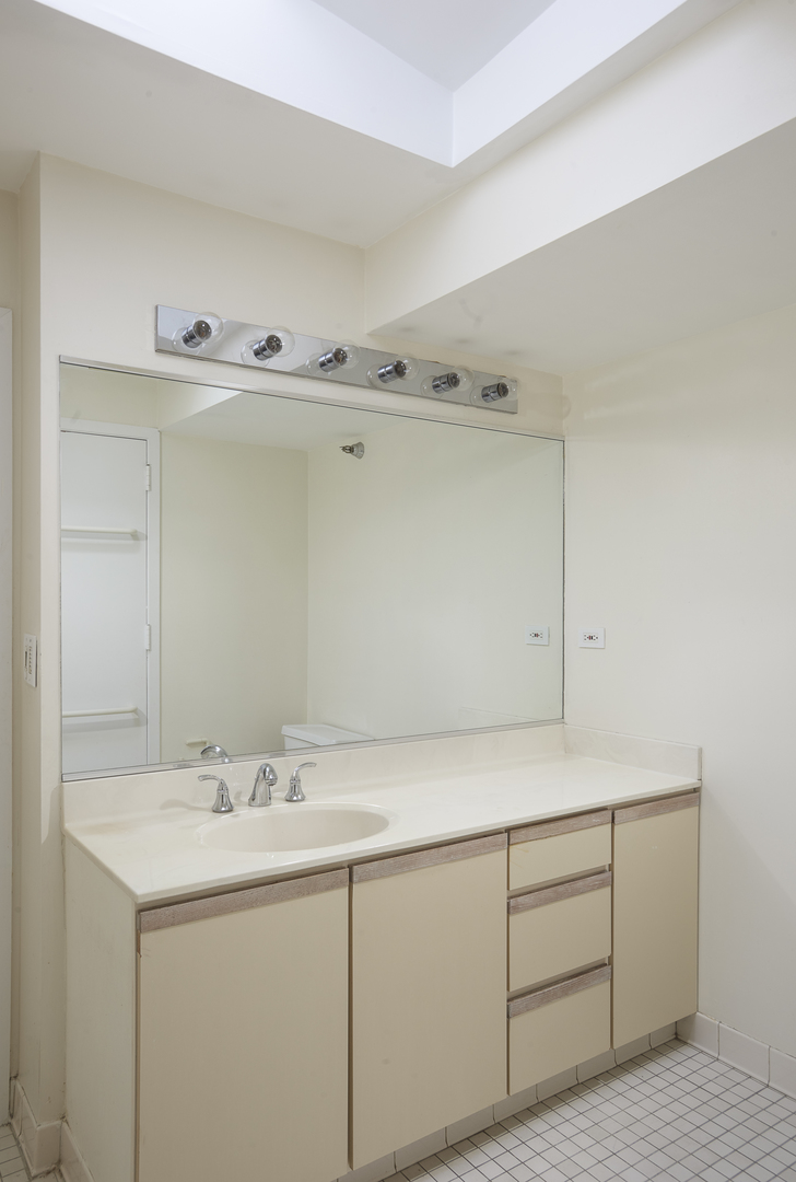 714 South Dearborn Street, Unit 9PH Chicago, IL 60605 - Photo 15 of 26 a utility room with cabinets