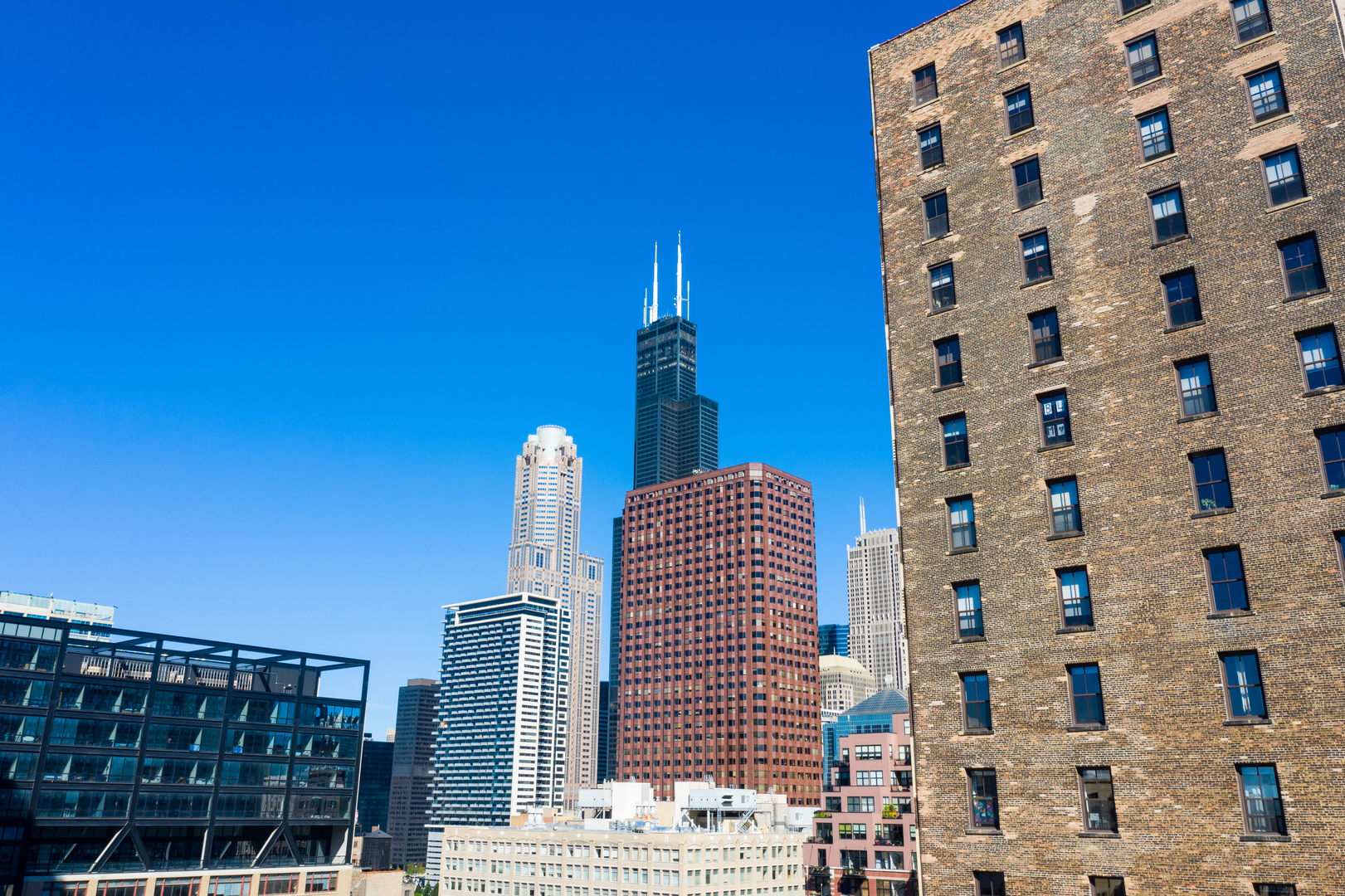 714 South Dearborn Street, Unit 9PH Chicago, IL 60605 - Photo 18 of 26 a view of a building with glass door