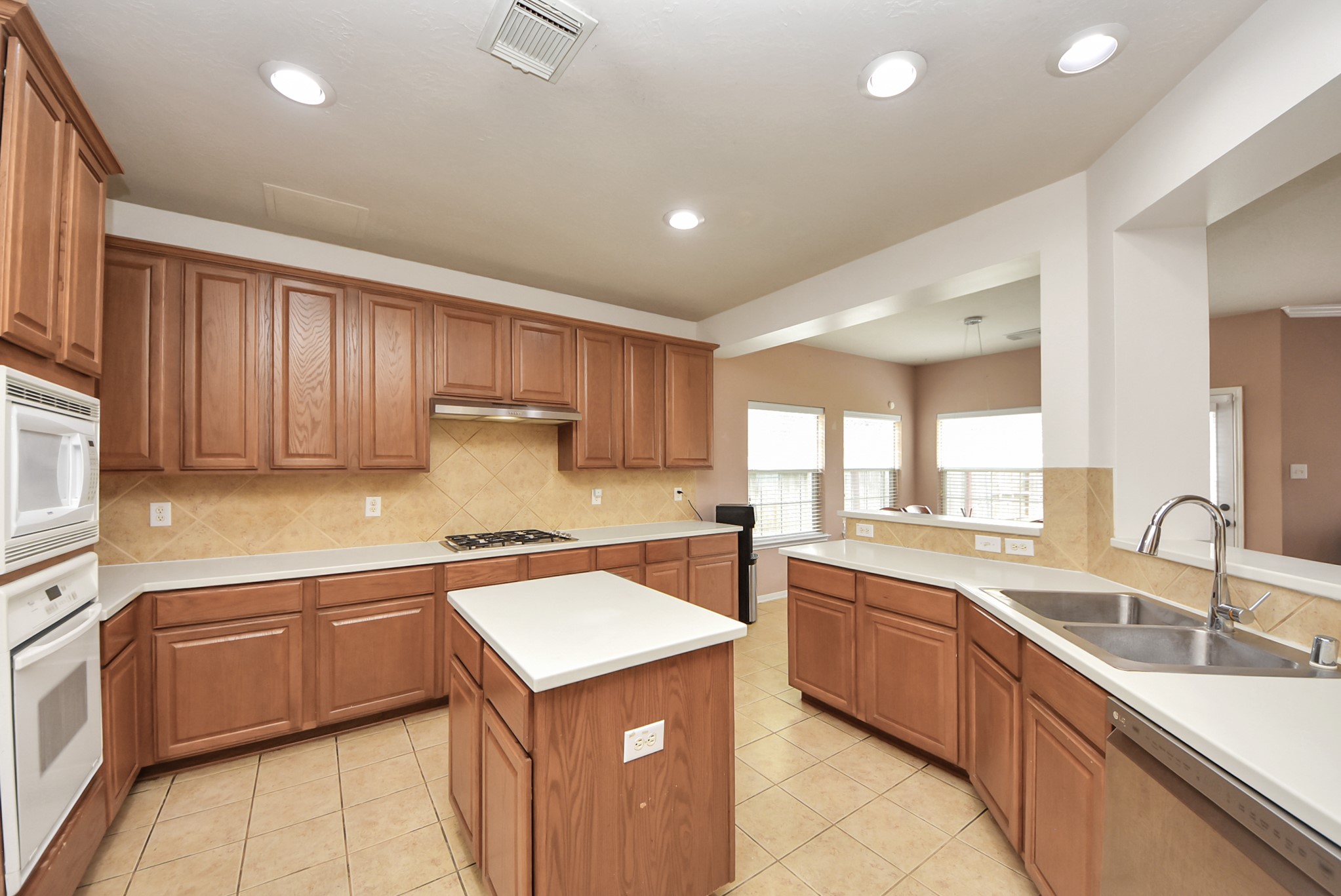 14103 Imperial Wood Lane Rosharon, TX 77583 - Photo 12 of 36 Functional kitchen layout with general counter space