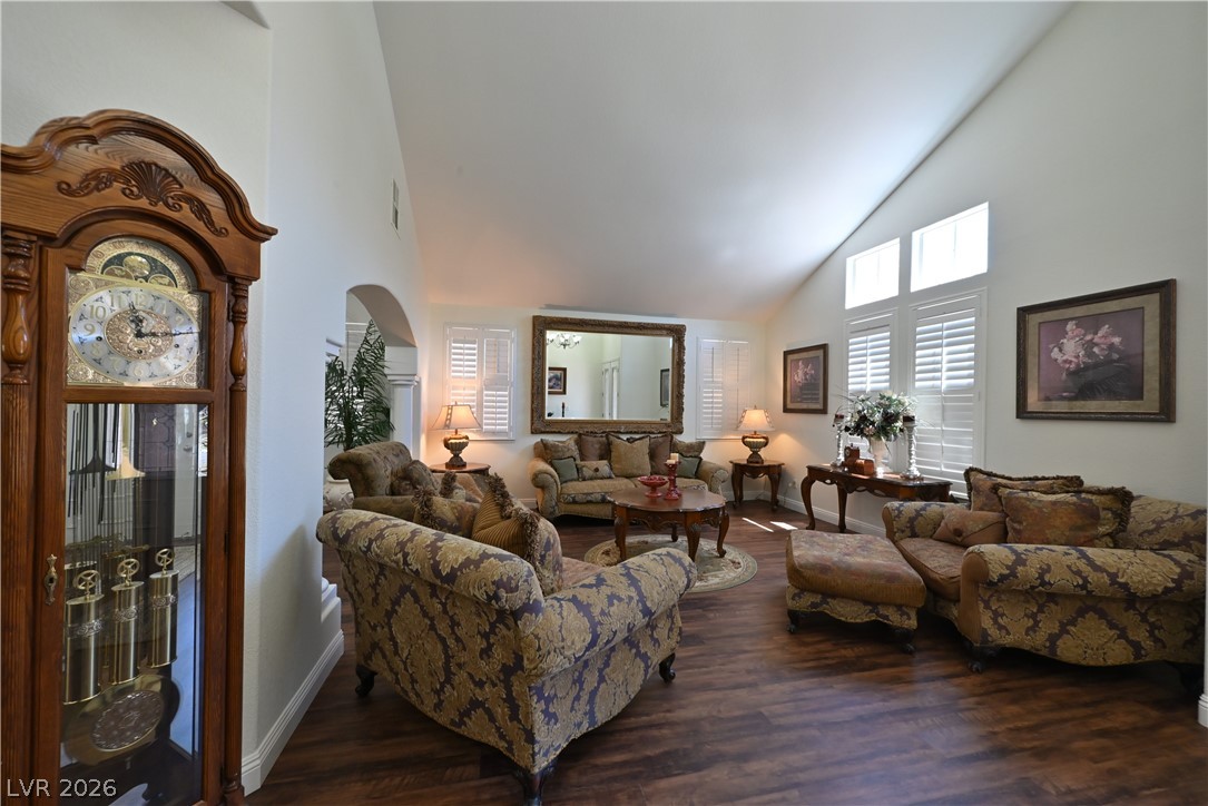 2729 Kildrummie Street Henderson, NV 89044 - Photo 14 of 42 Natural light bathes this comfortable gathering space with high vaulted ceilings and rich wood flooring.