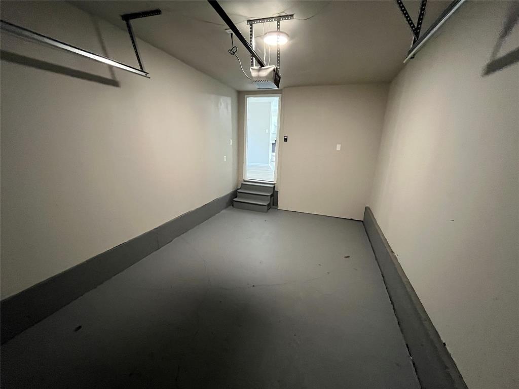 7642 Maxwell Avenue Dallas, TX 75217 - Photo 18 of 20 Garage with a garage door opener