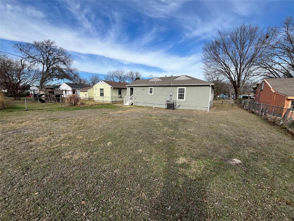 7642 Maxwell Avenue Dallas, TX 75217 - Photo 20 of 20 Back of house featuring a fenced backyard