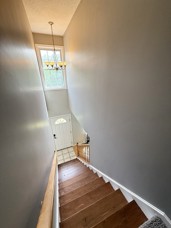 222 Bridge Street Warren, MA 01083 - Photo 17 of 40 a view of entryway and hall with wooden floor