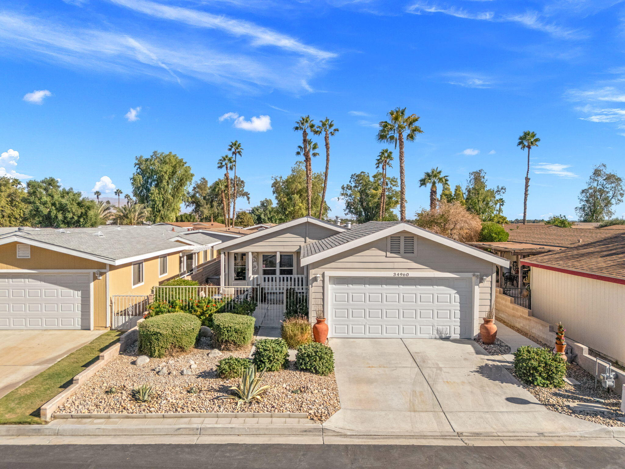34960 Serenade Thousand Palms, CA 92276 - Photo 2 of 50 a view of a house with a outdoor space