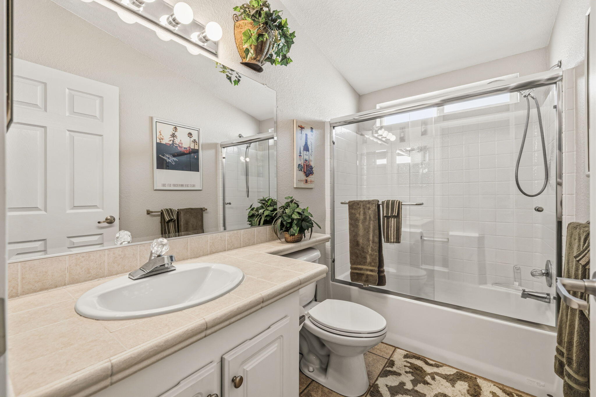 34960 Serenade Thousand Palms, CA 92276 - Photo 30 of 50 a bathroom with a sink toilet and shower