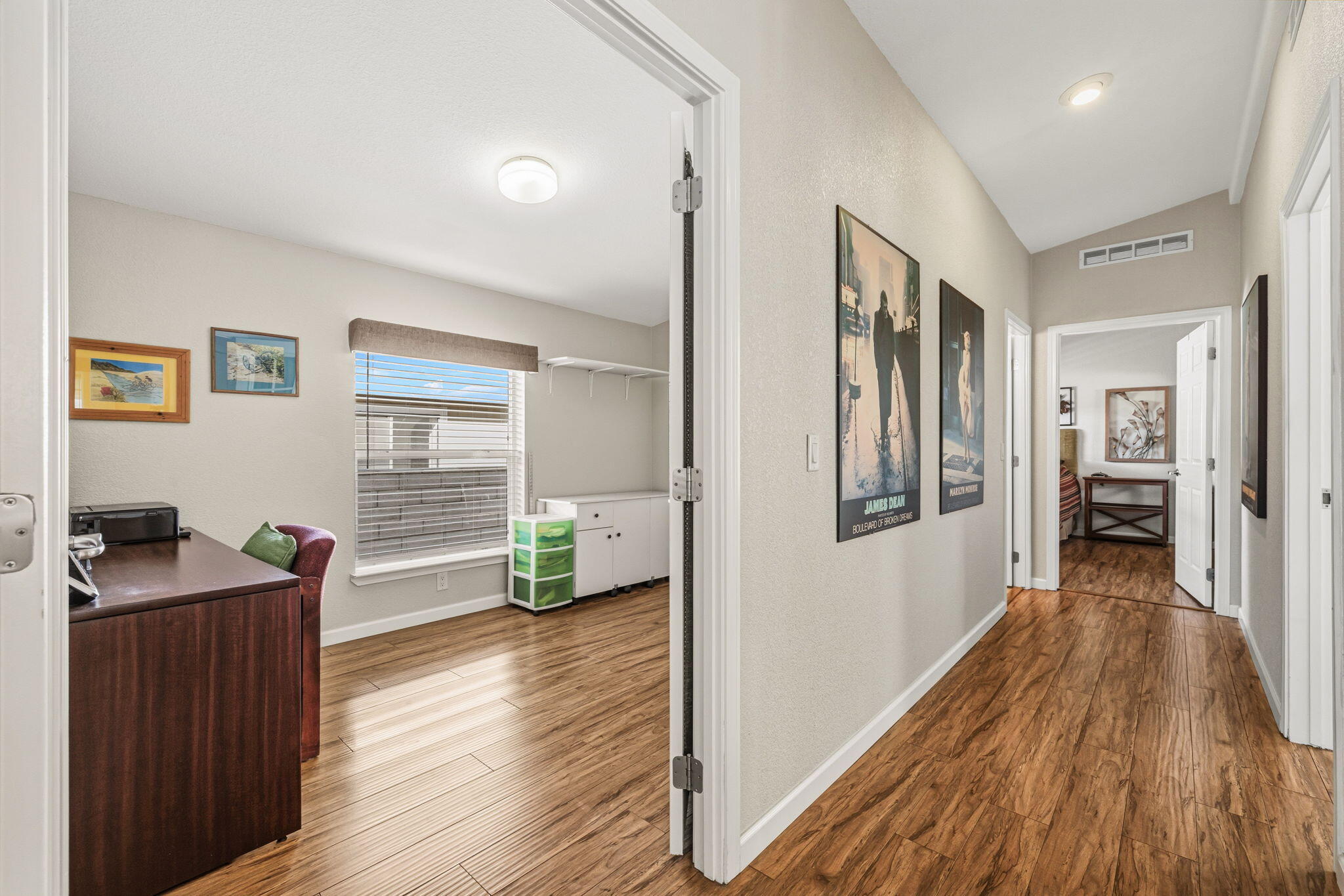 34960 Serenade Thousand Palms, CA 92276 - Photo 34 of 50 a view of a hallway and wooden floor and a livingroom