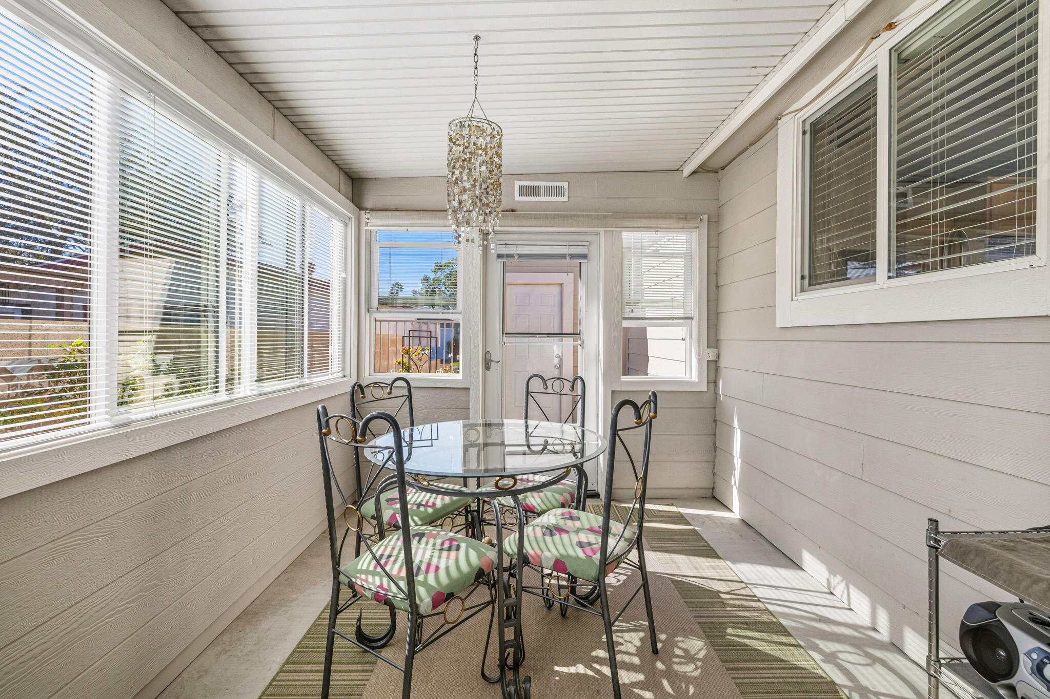 34960 Serenade Thousand Palms, CA 92276 - Photo 41 of 50 a view of a dining room with furniture window and outside view