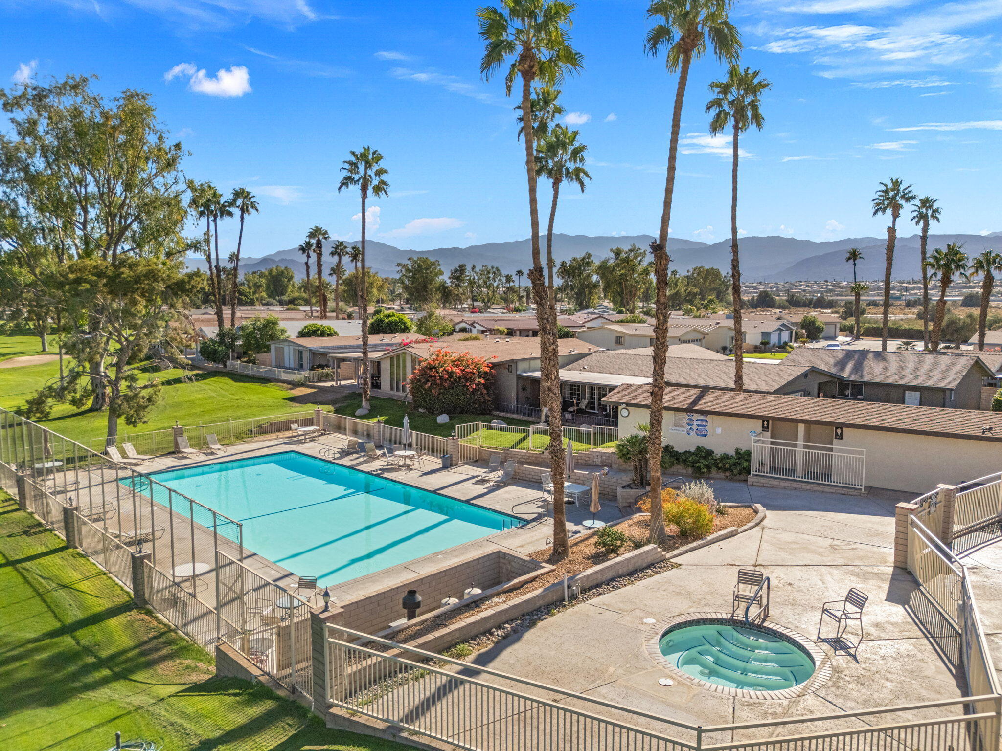 34960 Serenade Thousand Palms, CA 92276 - Photo 46 of 50 a view of a swimming pool with outdoor seating