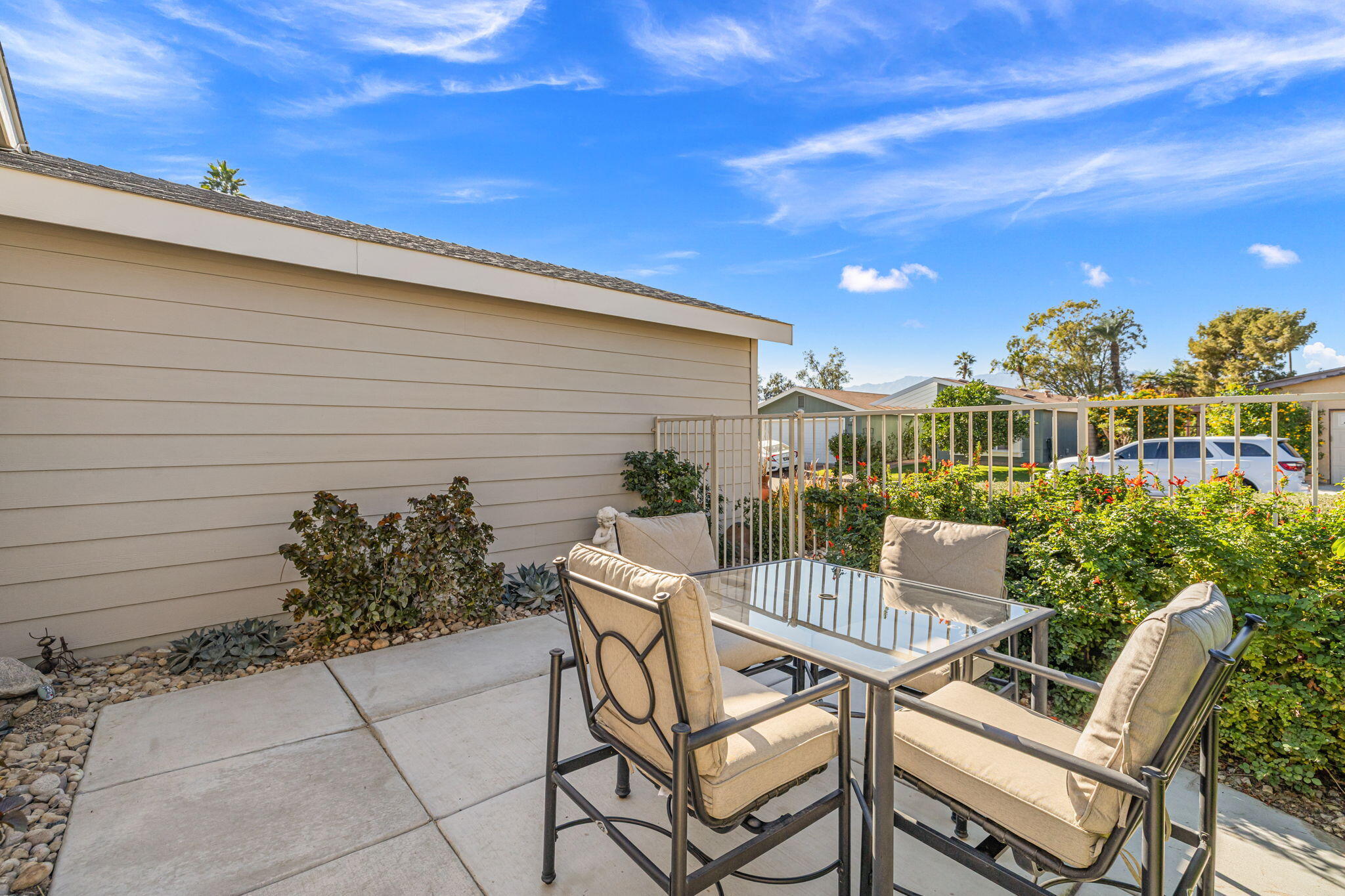 34960 Serenade Thousand Palms, CA 92276 - Photo 9 of 50 a view of a chairs and table in the patio