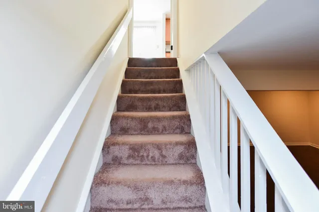 a view of staircase with white walls and white walls