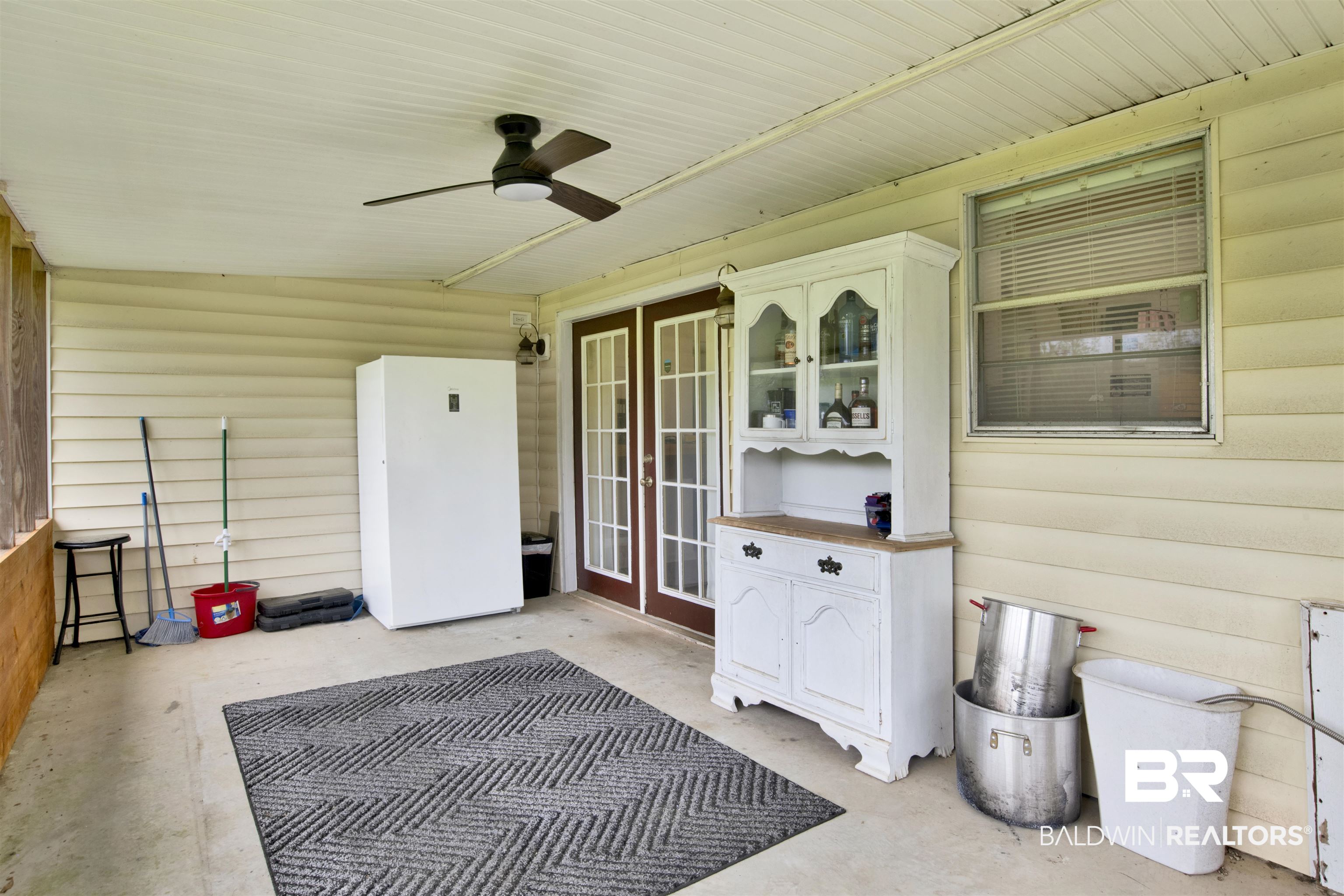 10244 Magnolia Road Irvington, AL 36544 - Photo 22 of 37 View of patio with a ceiling fan
