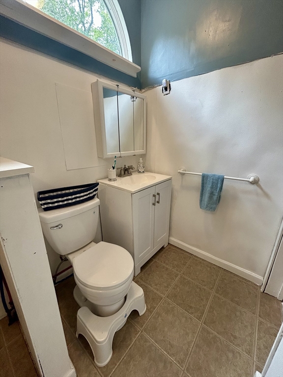 262 Old Wharf Road, Unit 67 Dennis, MA 02639 - Photo 22 of 36 a bathroom with a toilet and a sink