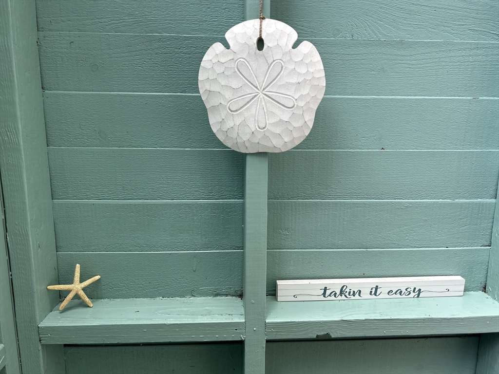 262 Old Wharf Road, Unit 67 Dennis, MA 02639 - Photo 25 of 36 a view of a bench in a bathroom
