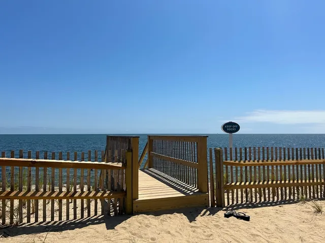 a view of wooden floor and sink