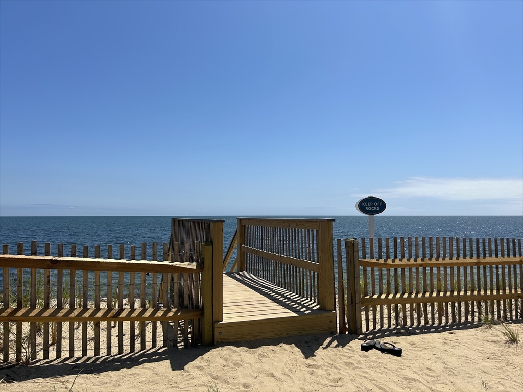 262 Old Wharf Road, Unit 67 Dennis, MA 02639 - Photo 29 of 36 a view of balcony with wooden floor