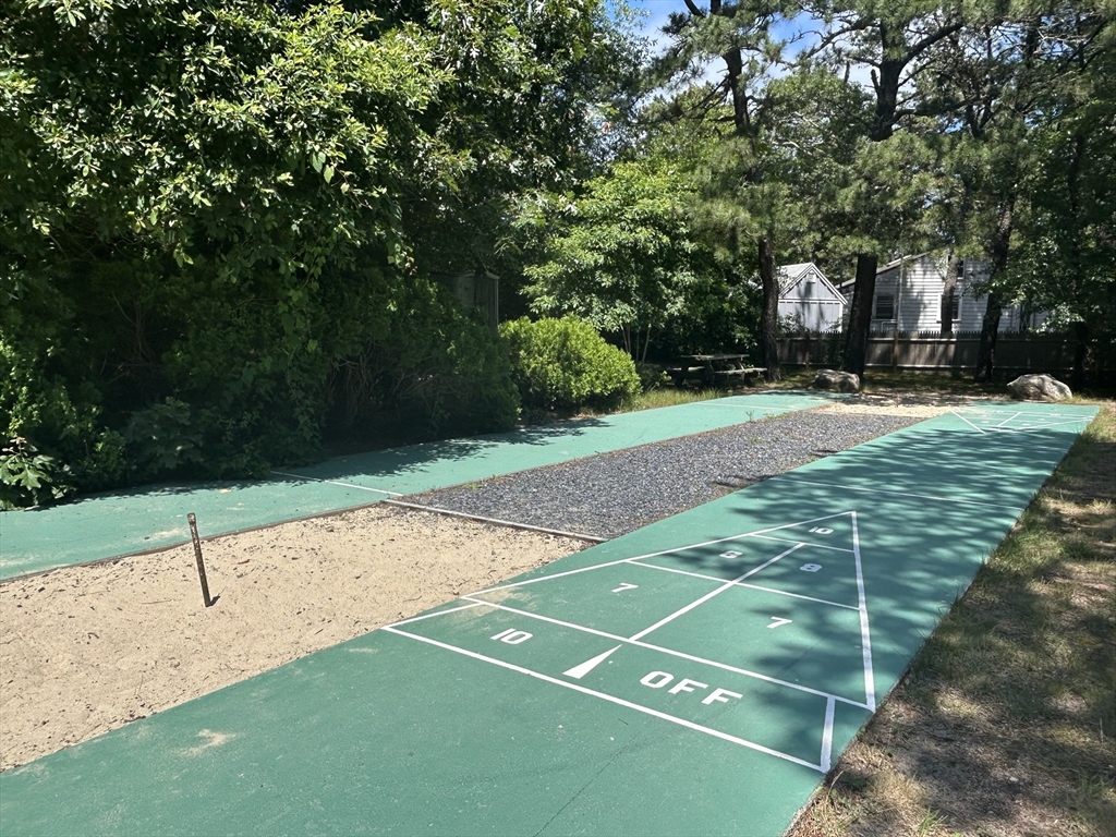262 Old Wharf Road, Unit 67 Dennis, MA 02639 - Photo 32 of 36 a view of a tennis court