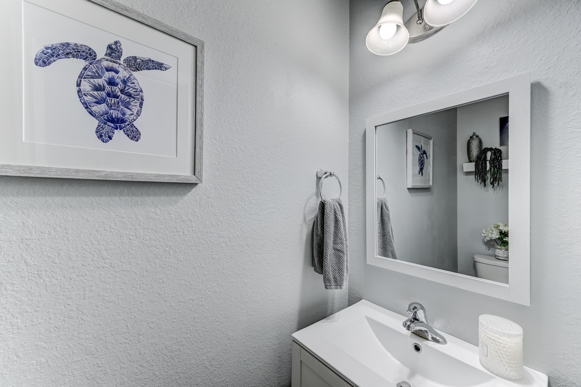 23831 Pennington Hills Drive Spring, TX 77389 - Photo 40 of 46 a bathroom with a sink and a mirror