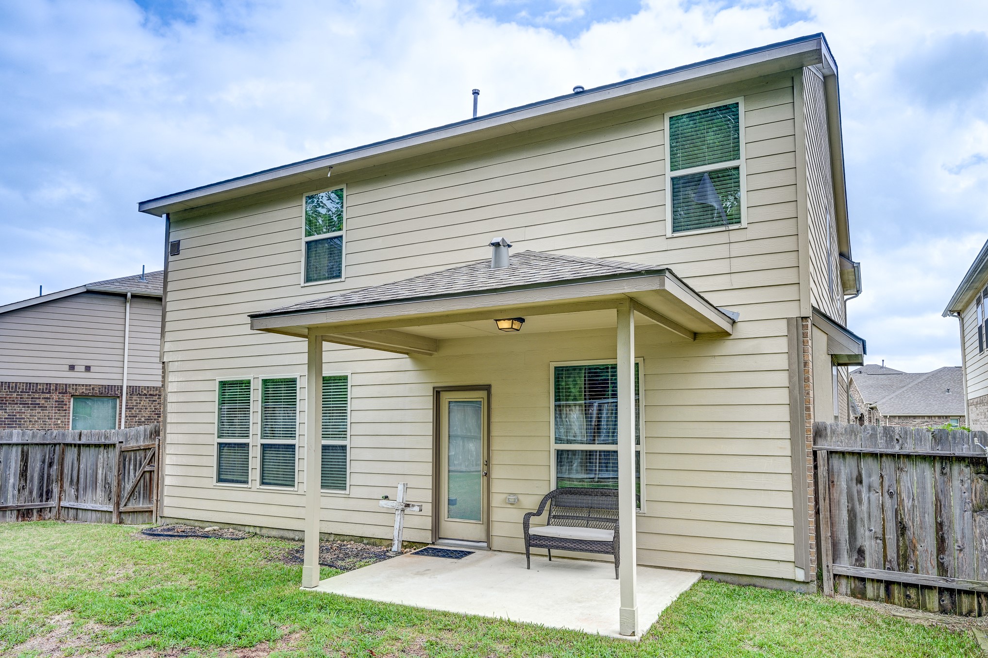 23831 Pennington Hills Drive Spring, TX 77389 - Photo 45 of 46 a front view of a house with a yard