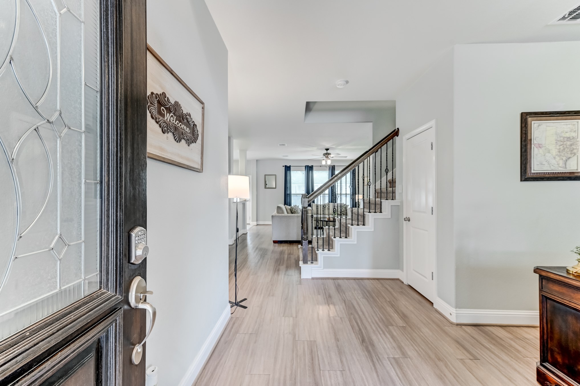 23831 Pennington Hills Drive Spring, TX 77389 - Photo 5 of 46 a view of entryway with wooden floor